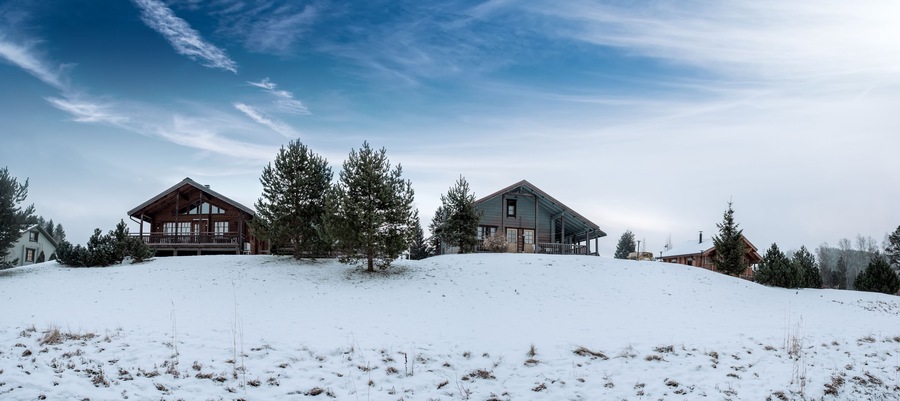 Wooden cottage in the winter's evening. Finland.