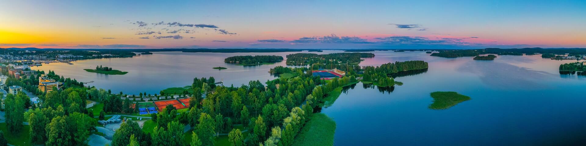 Sunset view of islands surrounding Finnish town Kuopio