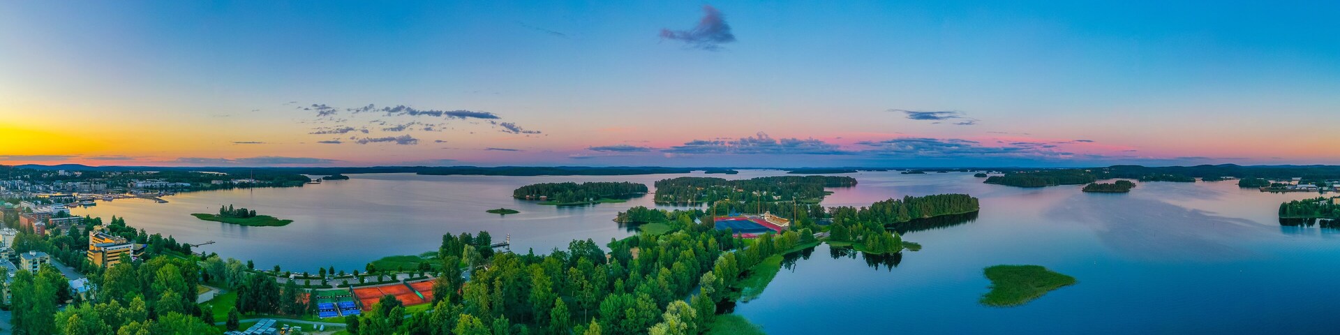 Sunset view of islands surrounding Finnish town Kuopio