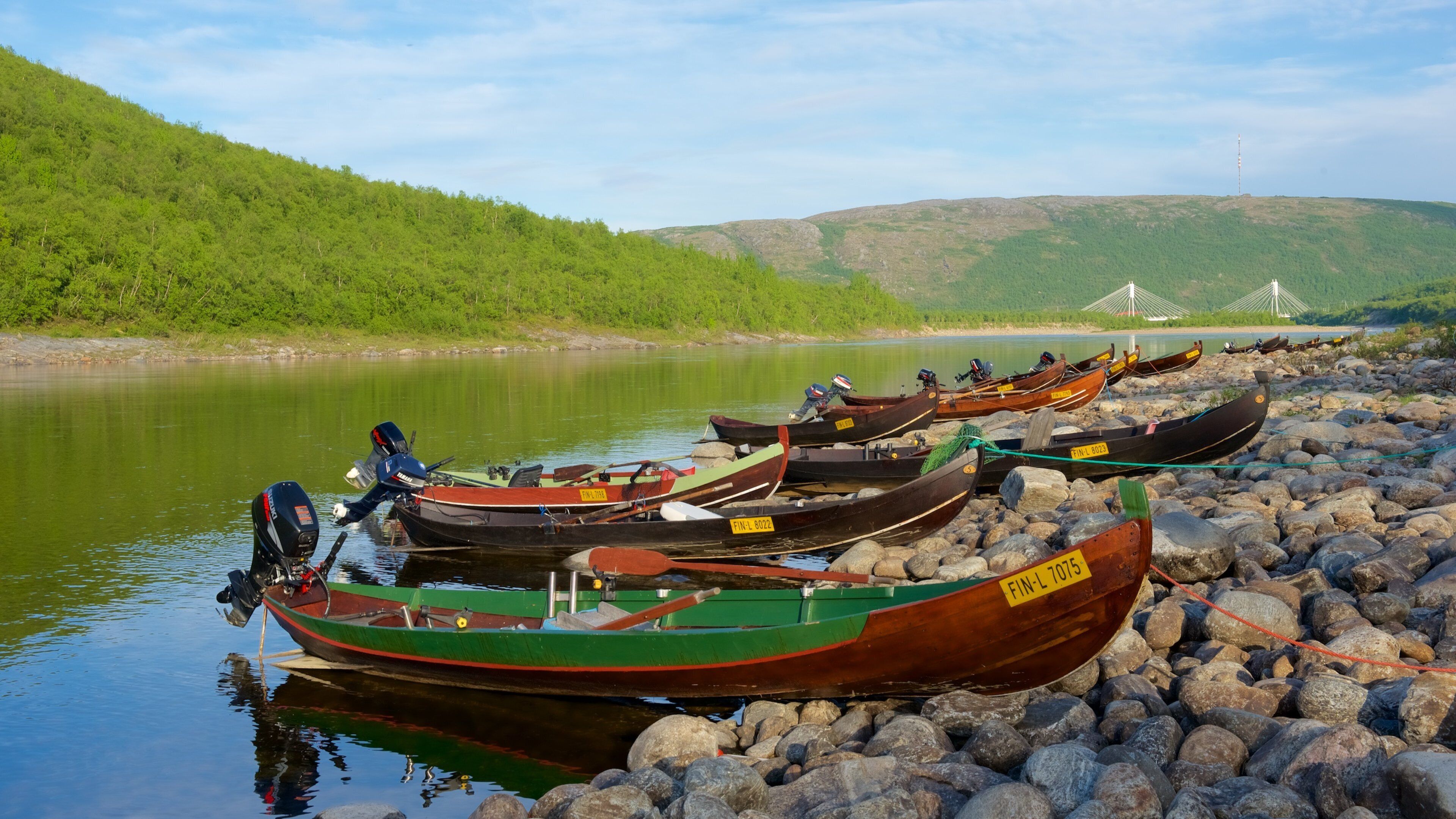 Utsjoki featuring a river or creek, boating and a pebble beach