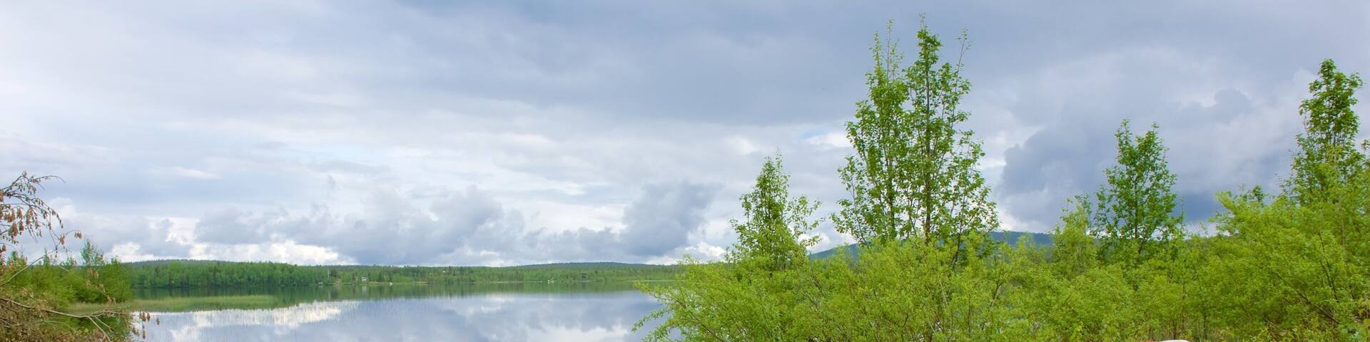 Akaslompolo which includes kayaking or canoeing, tranquil scenes and a river or creek