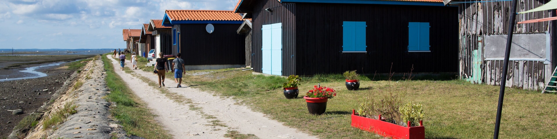 Colorful houses in the French fishing port of Gujan Mestras in Arcachon bassin , Gironde, France; Shutterstock ID 710371216; purchase_order: SP-1332 HA Batch 2 August 2018; Order: ; client: HomeAway;