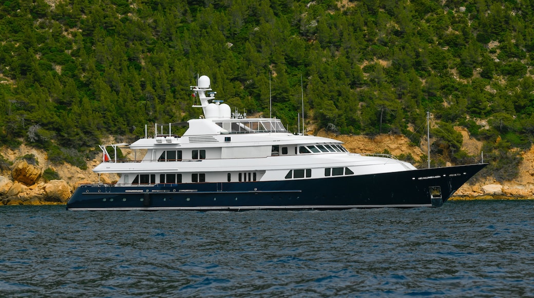 Scenic view of Magnificent luxury yacht and Cap Canaille headland and Cassis in south of France, High quality photo