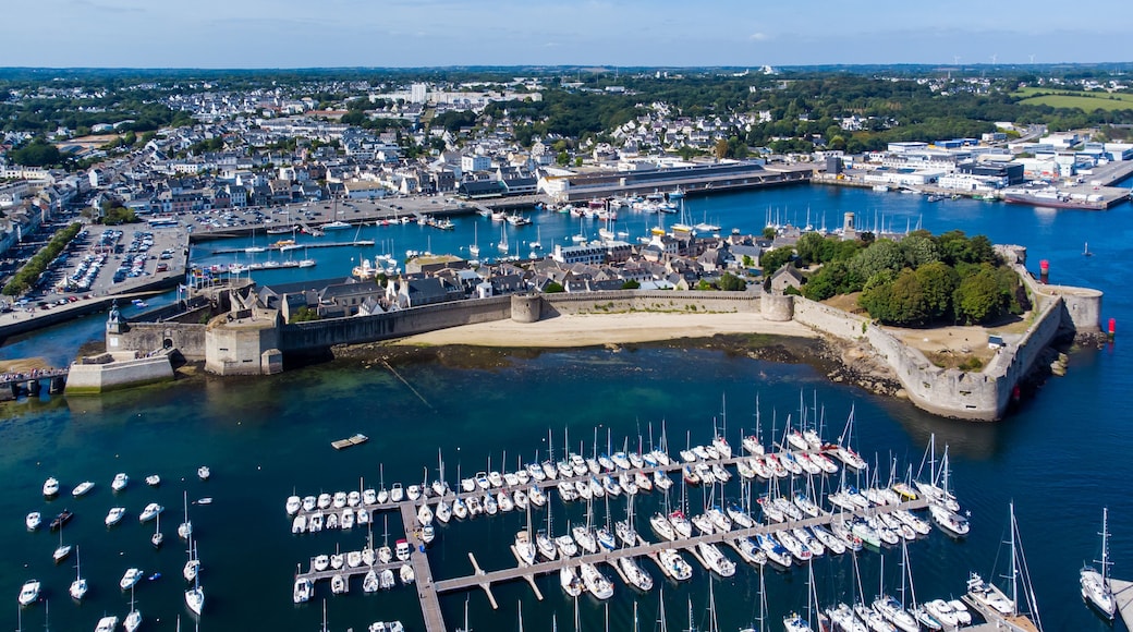 Aerial view of Concarneau, a medieval walled city in Brittany, France - Sandy beach under the fortifications of this island located in a bay along the coast of the Atlantic Ocean