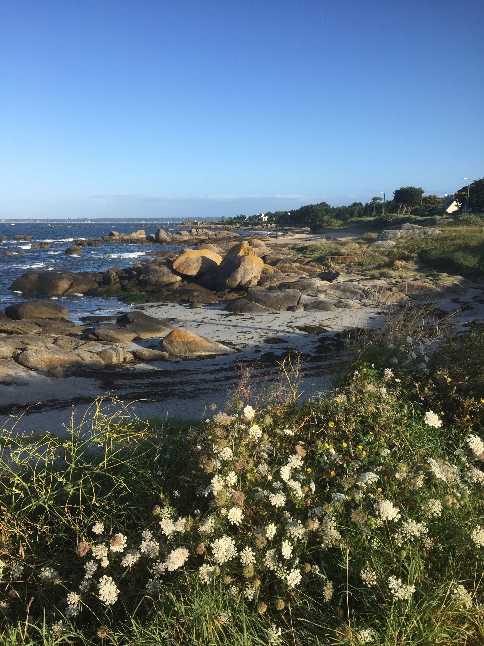 Lovely path around the rocky coast past numerous sandy bays. 