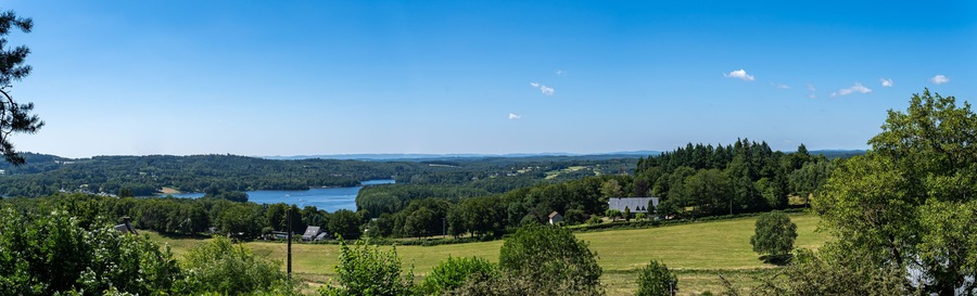 Panorama on Lake Neuvic la Triouzoune with boats, Correze Summer 2021