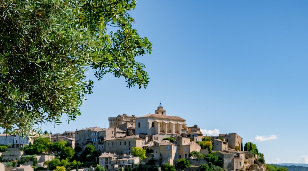 couple visit the old town of Gordes Provence,Blooming purple lavender fields at Senanque monastery, Provence, southern France Europe. Romantic village of Gordes