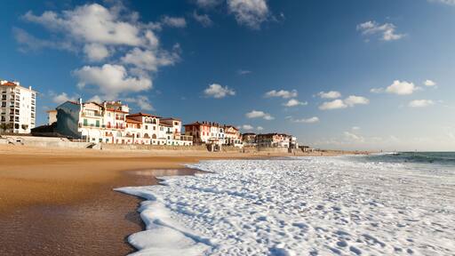 A large white water wave sliding on the Hossegor beach - France