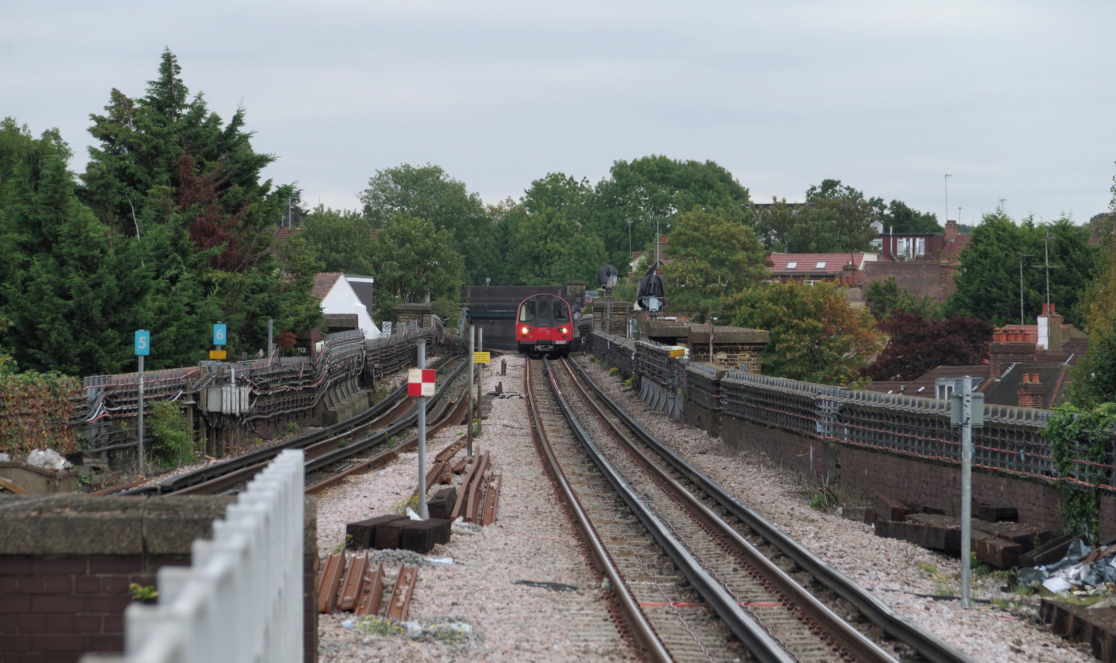 A Northern Line 1995 Stock train approaches Brent Cross tube station, working the N047 service to Edgware.