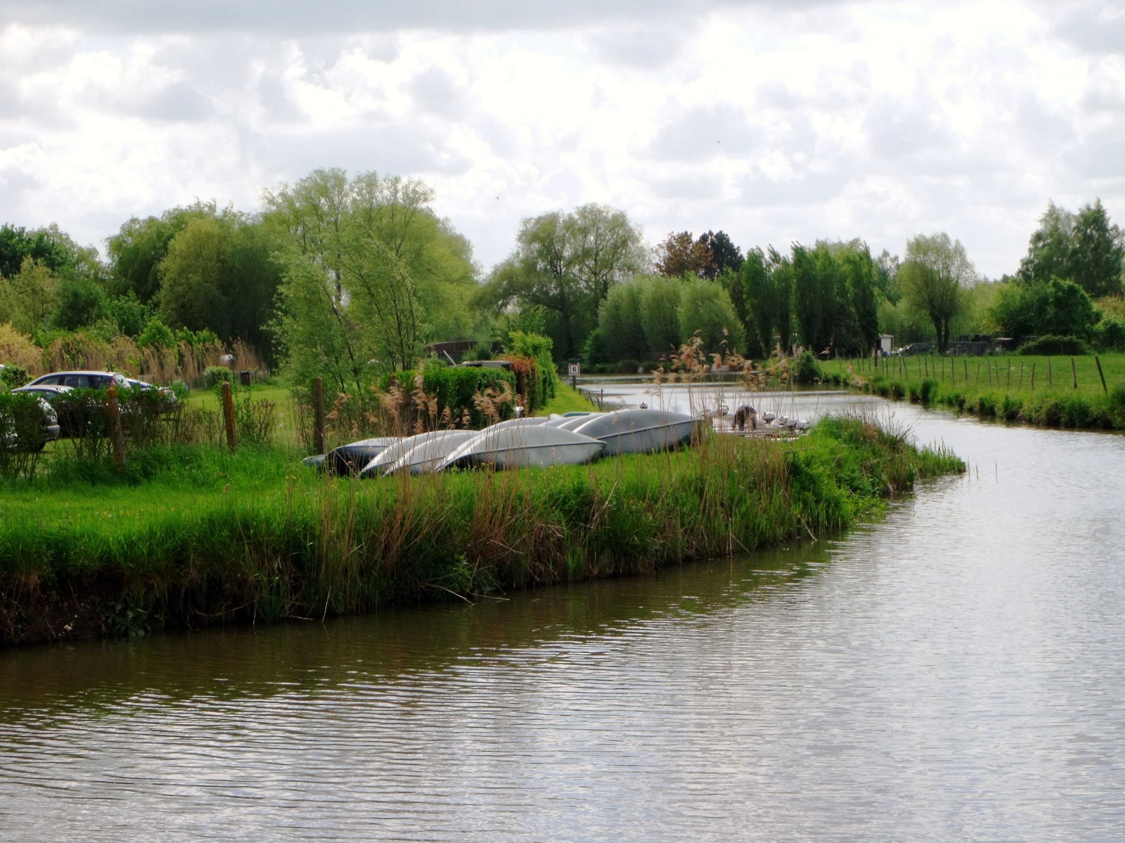 Some marshes near the town are accessible by small boats. The area is very fertile and vegetables are on sale at this spot alongside an 'estaminet', a local hostelry.
