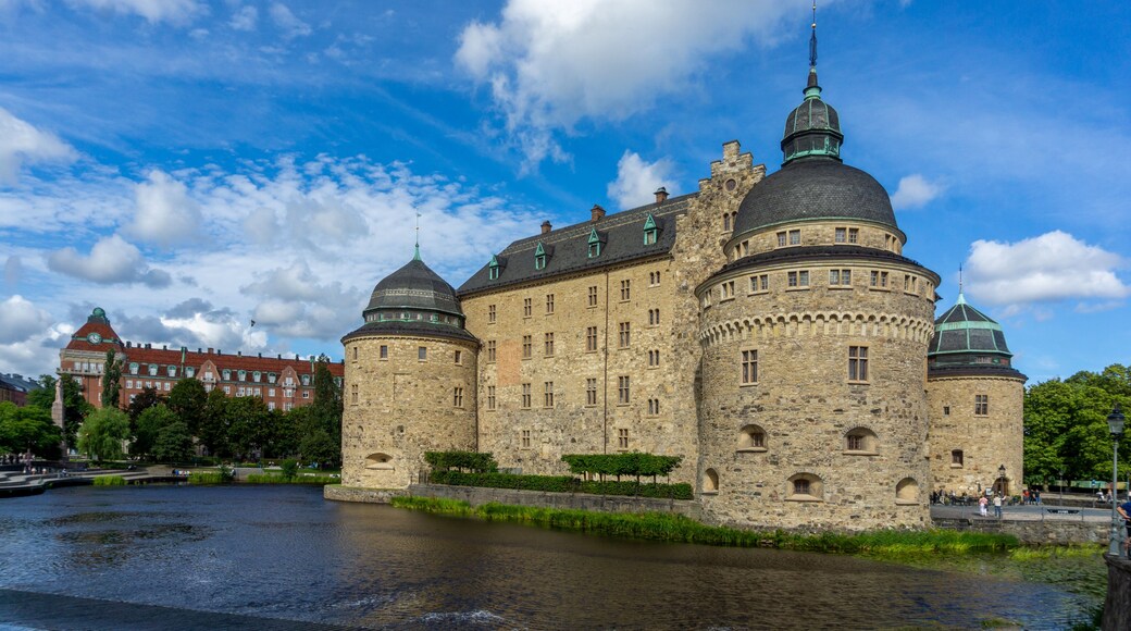 Romanesque Örebro Castle in Sweden standing over Svartån river