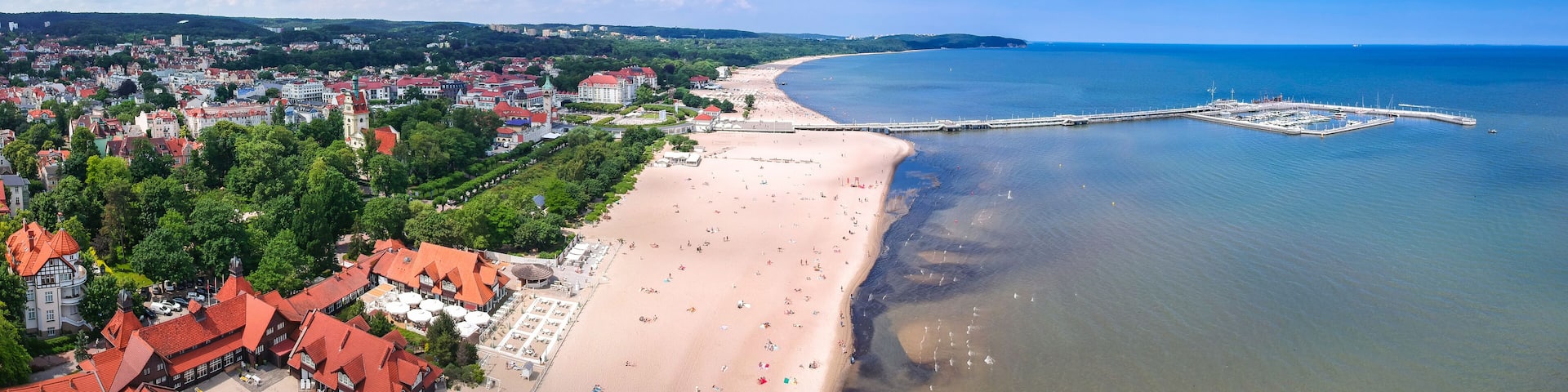 Panorama of the Baltic sea coastline with wooden pier in Sopot, Poland