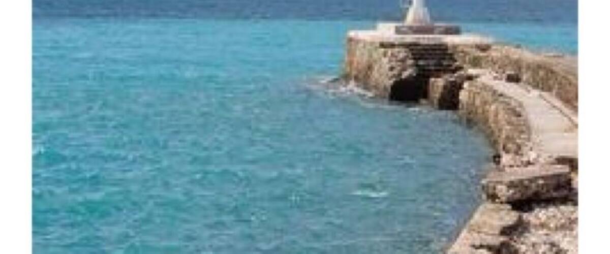 Standing at the mouth of the canal on the Gulf of Corinth.