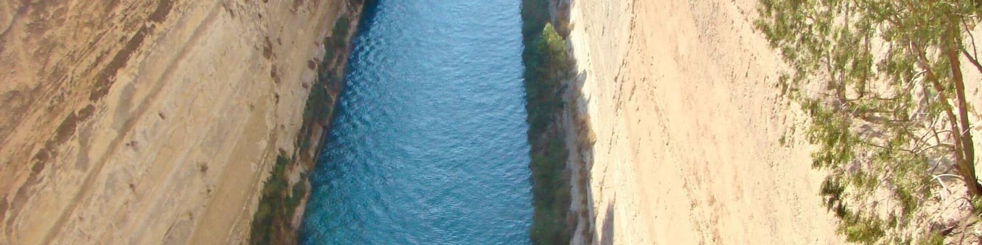 A river canyon with a bridge.
