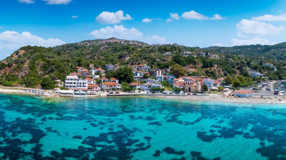 Panoramic view of the idyllic fishing village Loutraki, port of Glossa, at the Sporades island Skopelos, Greece