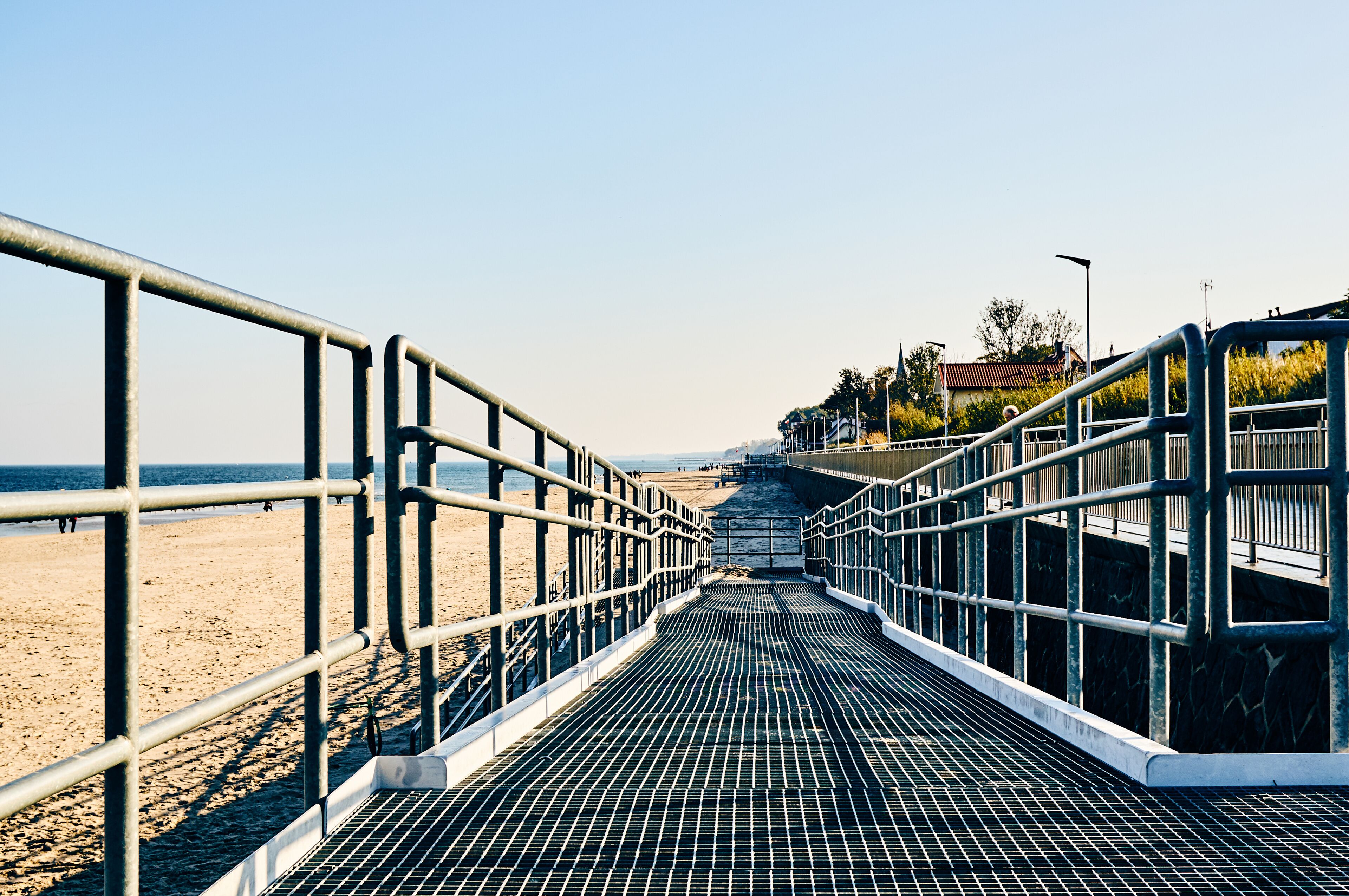 Metal entrance to the beach in Sarbinowo, Poland during daylight