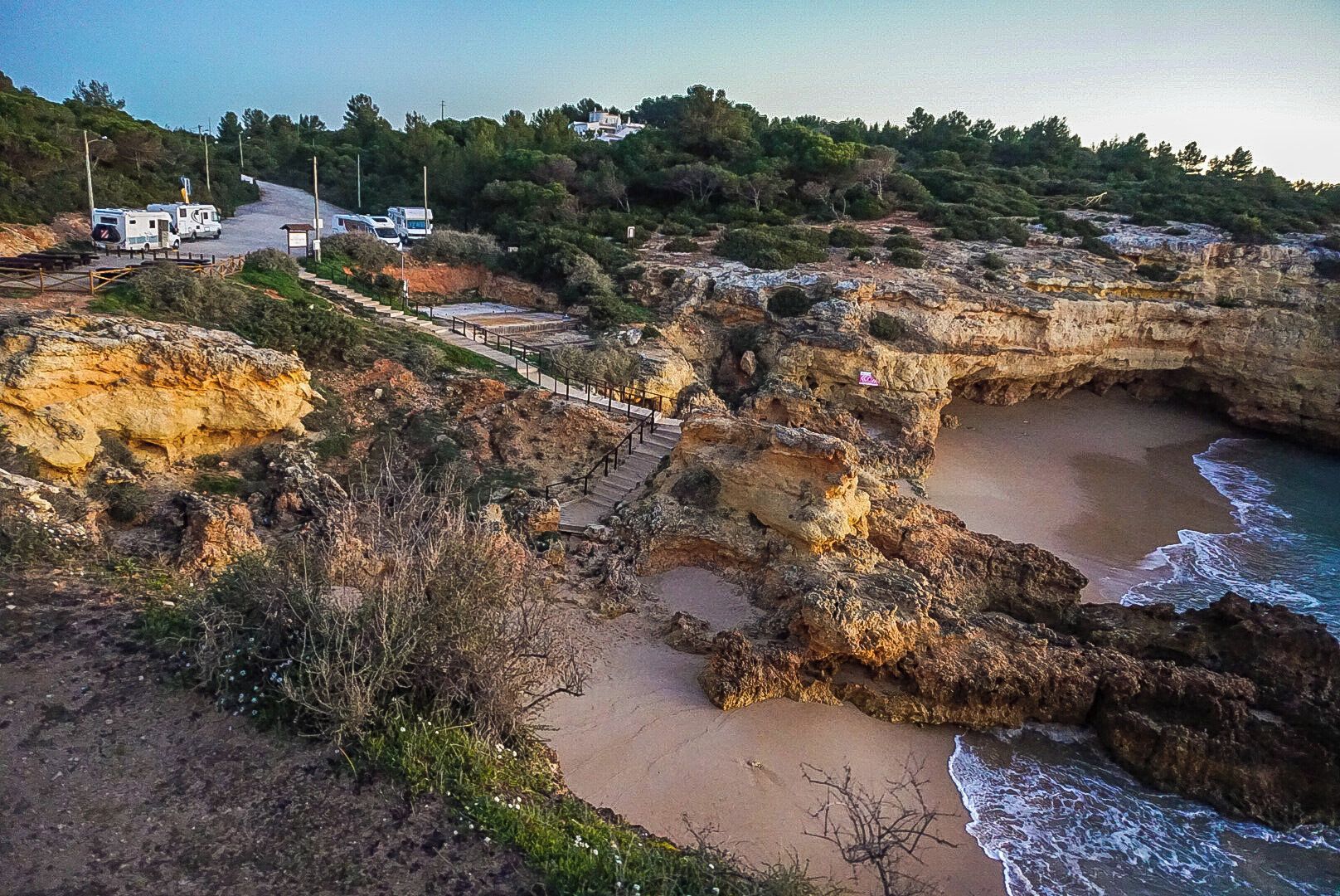 Great rock kliffs and small beach