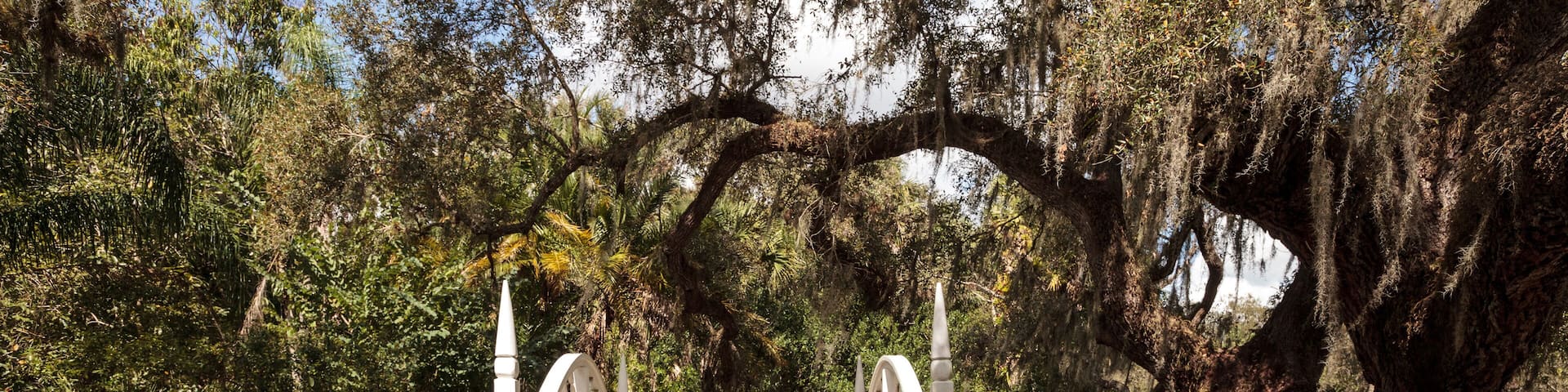 Old wooden bridge along the riverway at historic Koreshan State Park.