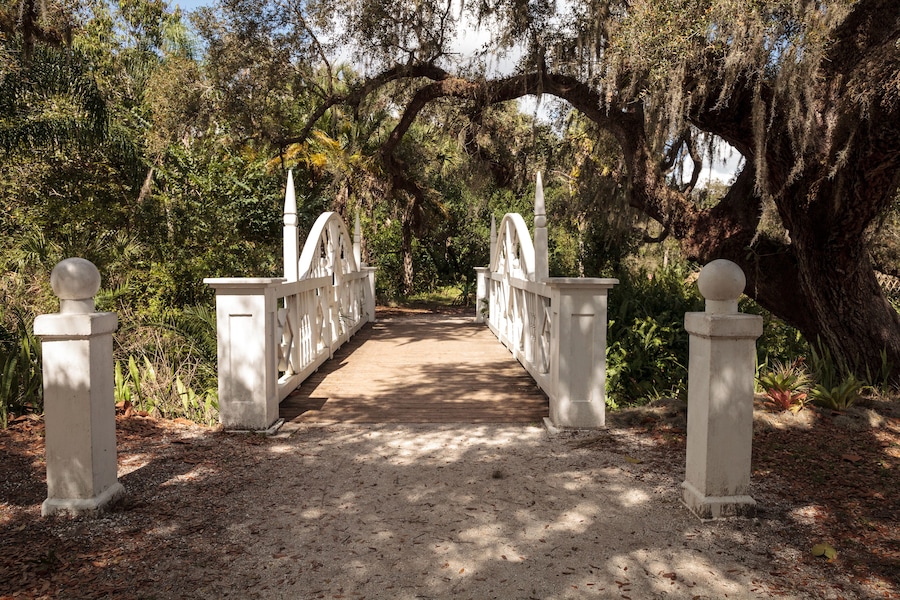 Old wooden bridge along the riverway at historic Koreshan State Park.