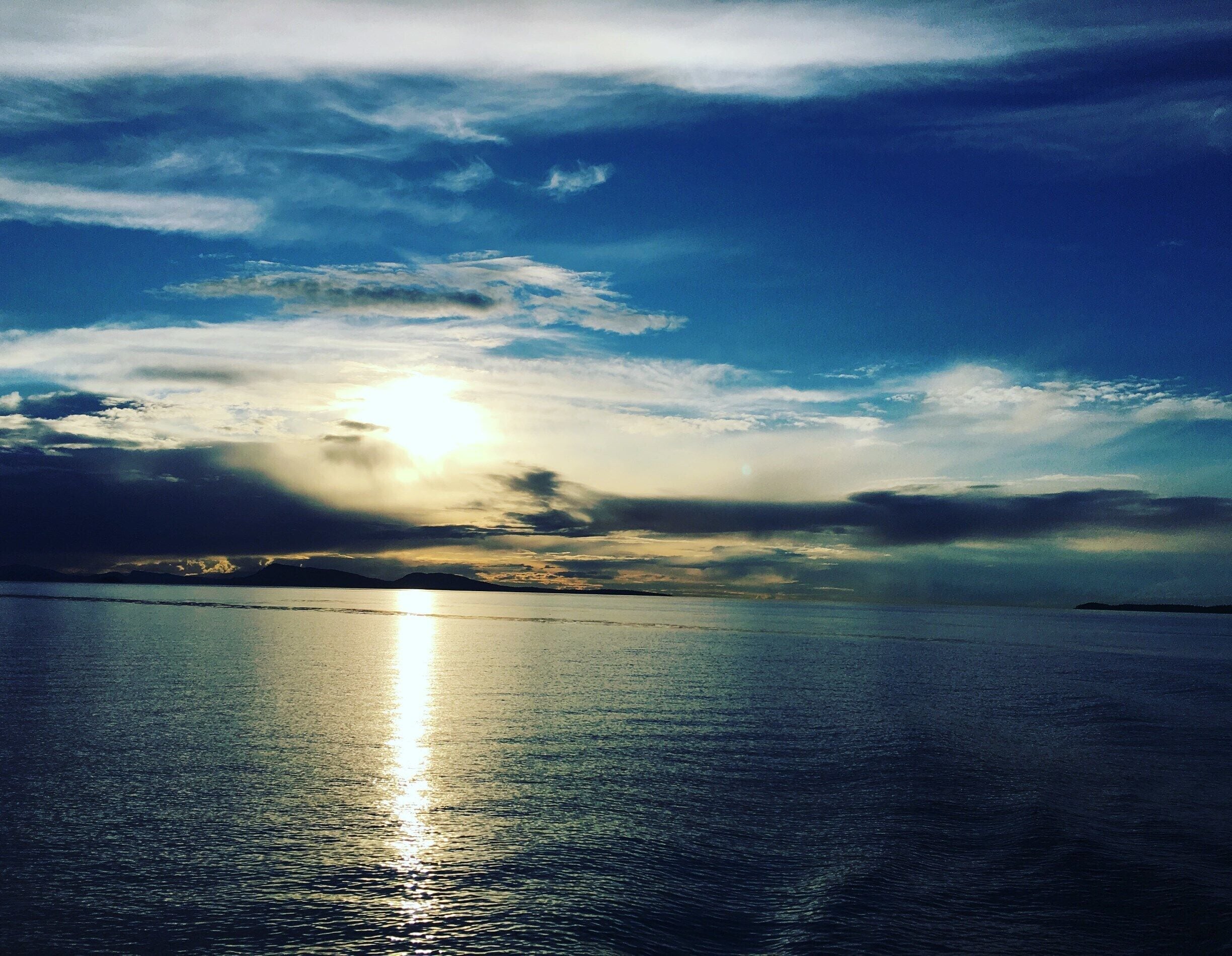 On a boat looking for whales at dusk off of Orcas Island #LifeAtExpedia
