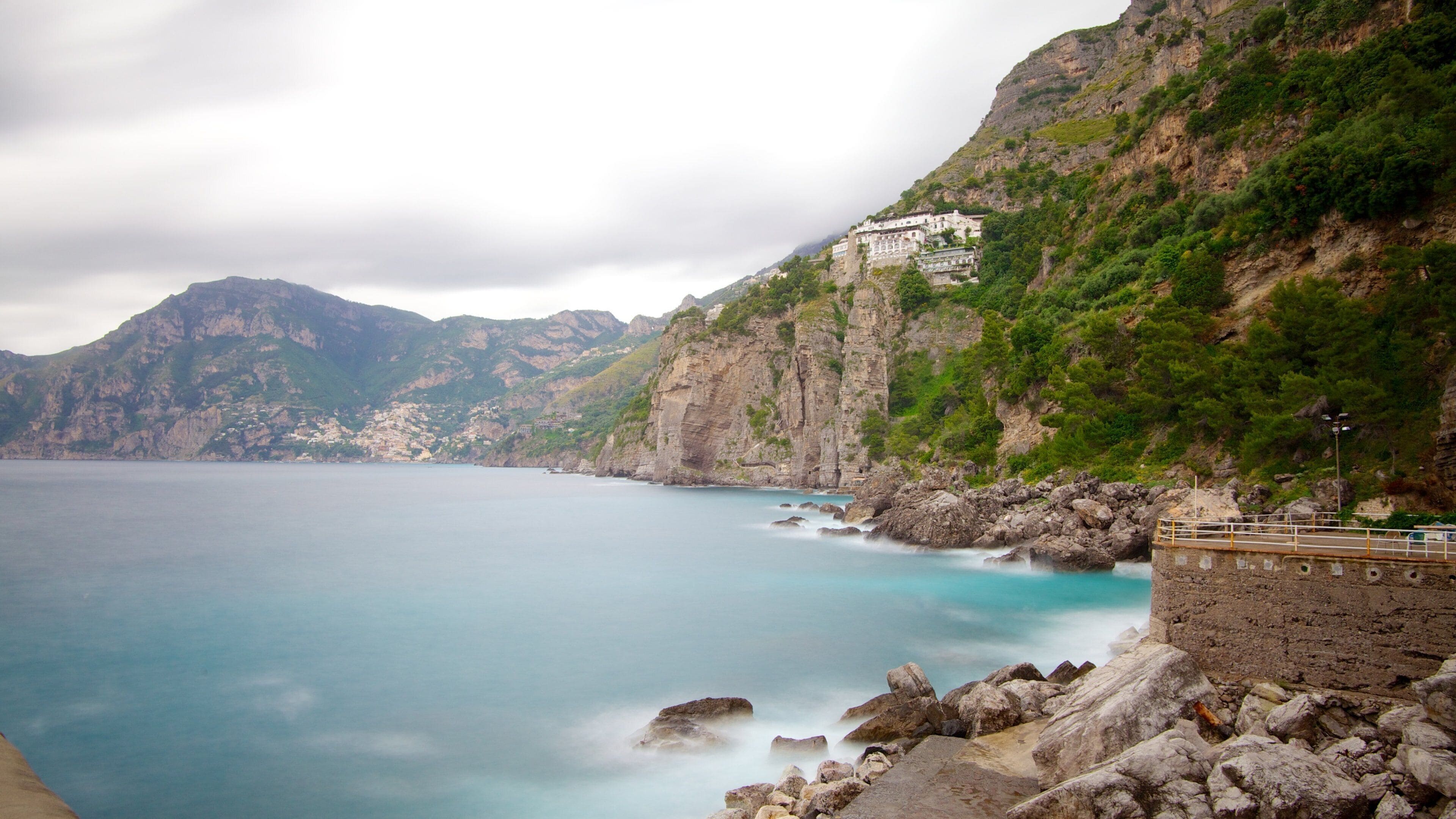 Praiano which includes mountains and rugged coastline