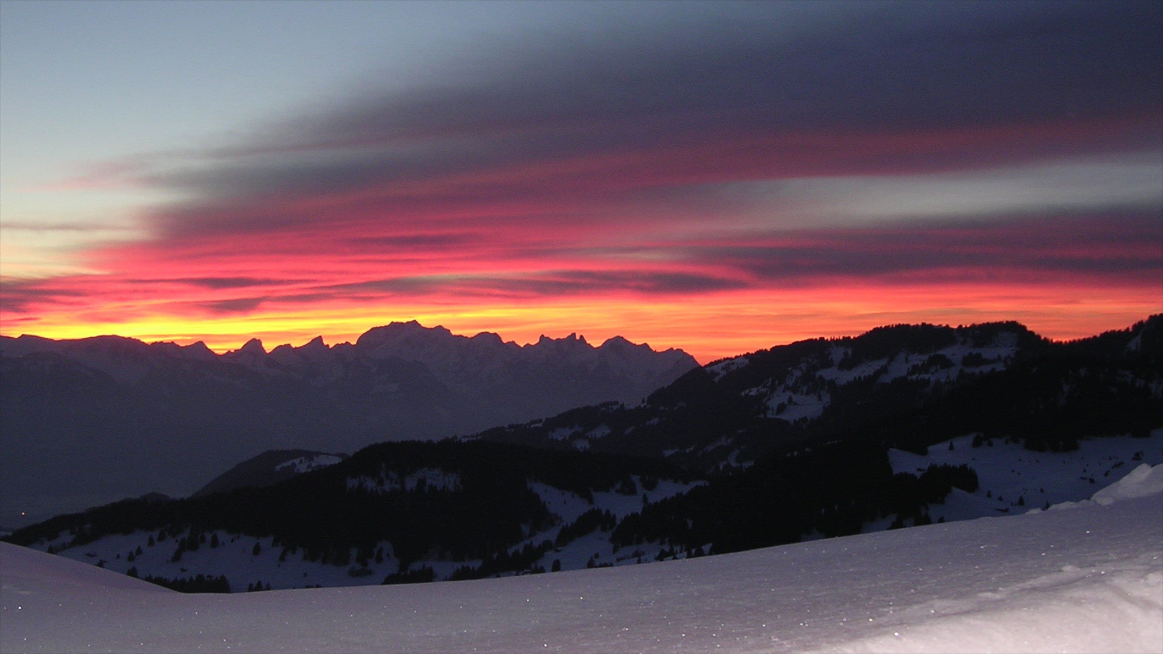 Gryon which includes a sunset, mountains and landscape views