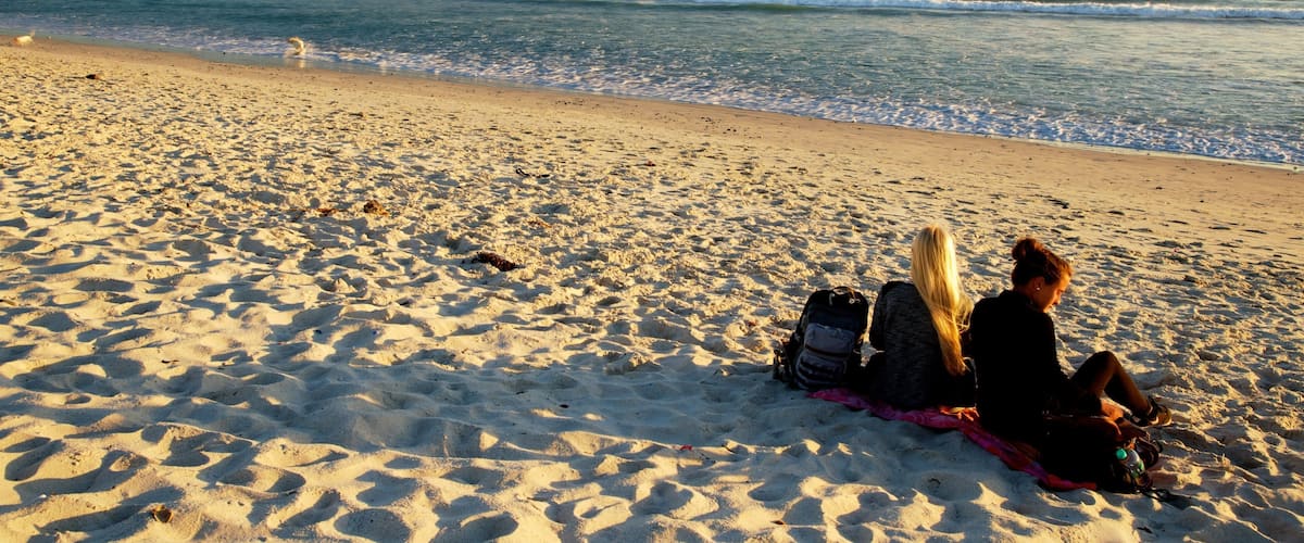 Tableview showing general coastal views, a sunset and surf