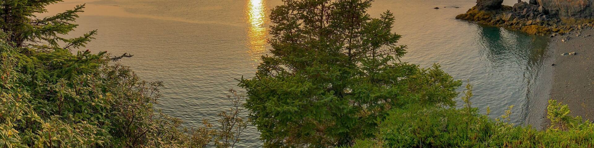 Smokey sunset overlooking the arch and Kachemak Bay in Halibut cove. #Adventure