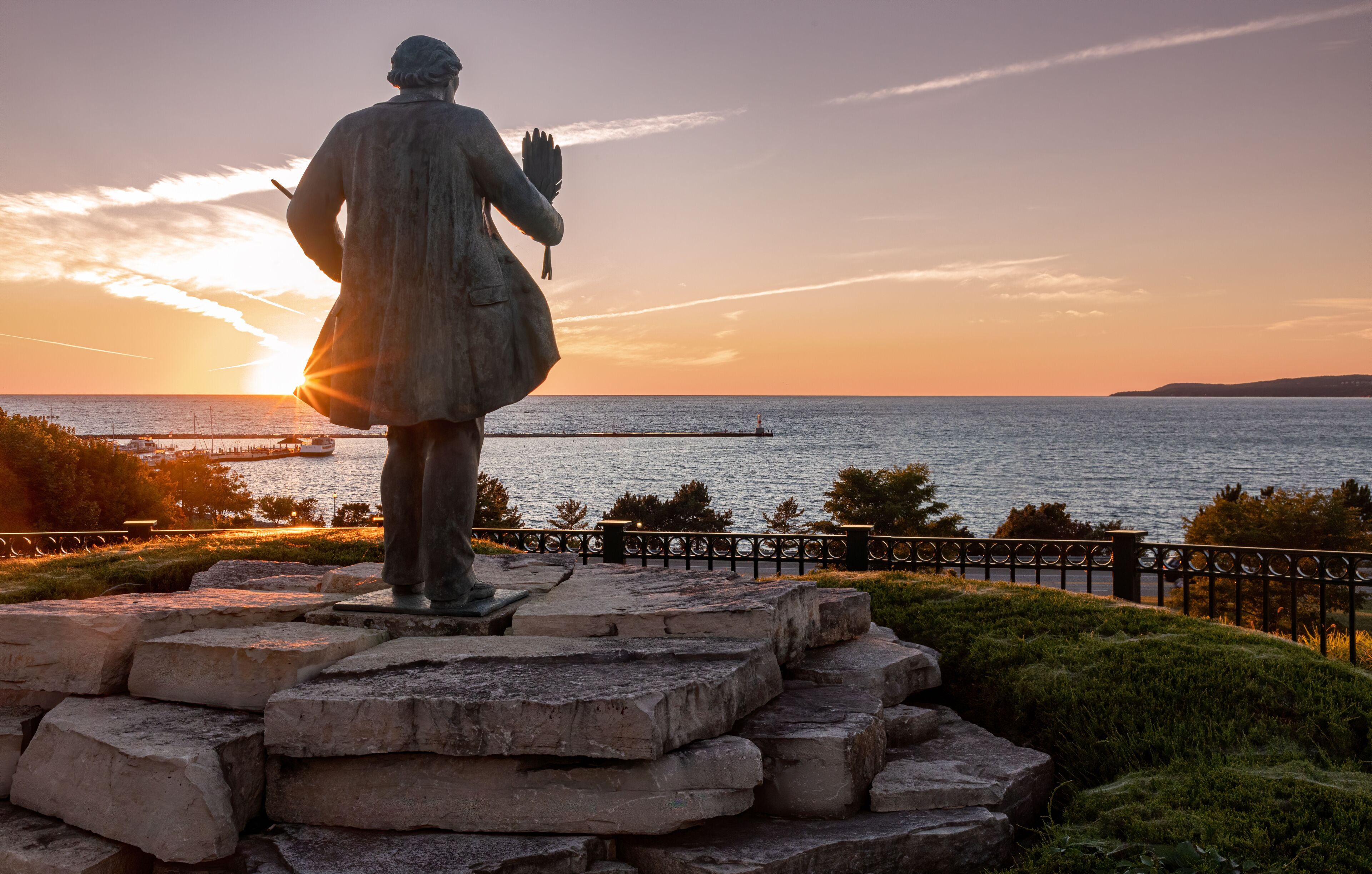 Statue of Chief Ignatius Petoskey overlooking Little Traverse Bay, Lake Michigan.
