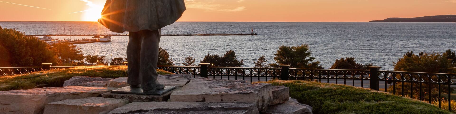 Statue of Chief Ignatius Petoskey overlooking Little Traverse Bay, Lake Michigan.