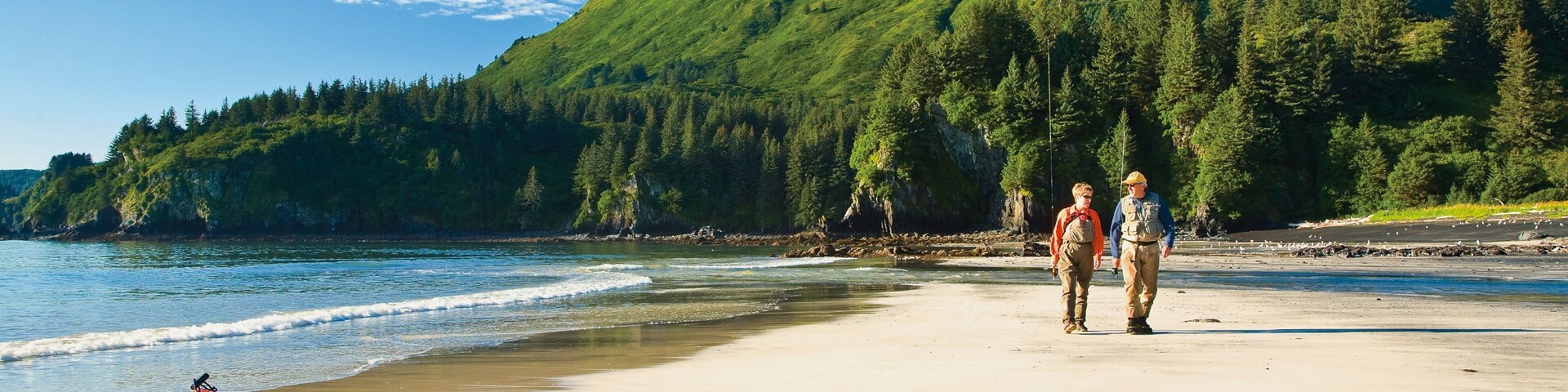 Kodiak Island showing a sandy beach, kayaking or canoeing and mountains