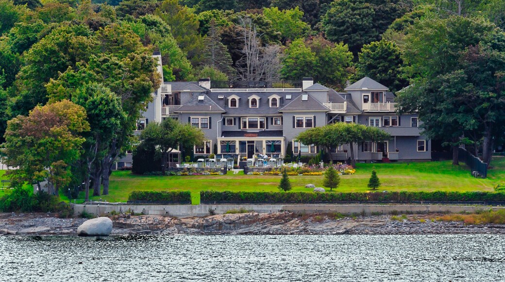 Old gray wood inn on the coast of Maine near Bar Harbor
