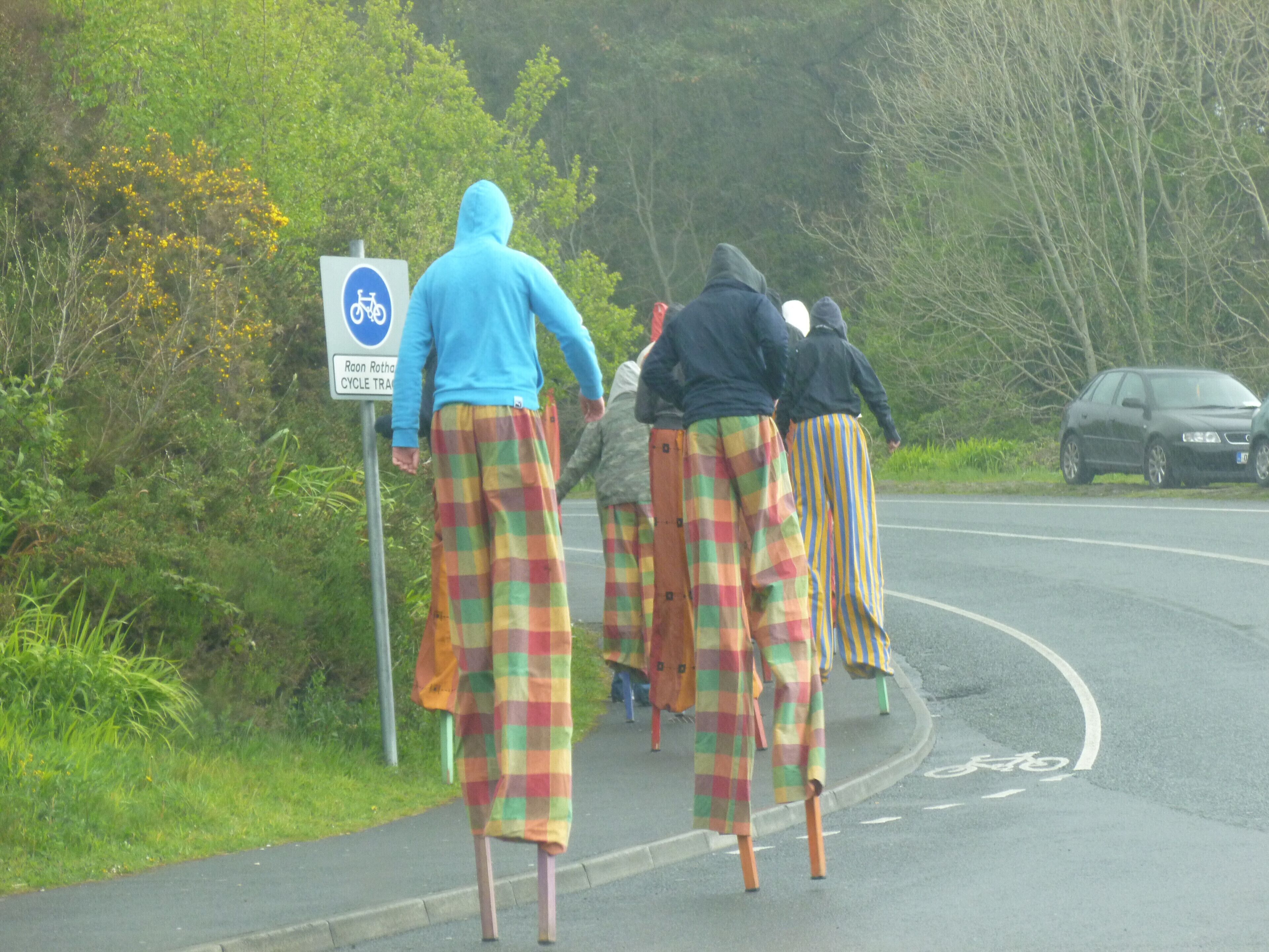 We got a little lost driving through Clifden. Fortunately. Or we would have missed this. As it was explained to us, Irish students have a year of "non-traditional" school. And these kids were learning to stilt walk. And doing quite well. In the pouring rain. One of those things from traveling we'll never forget, and still chuckle about when we think of it. 