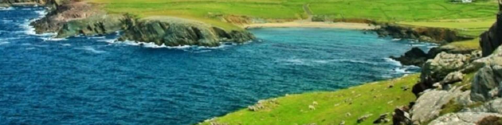 The western coast of Ireland offers some of the clearest and most beautiful water one can ask for. It also boasts amazing landscapes, beautiful green fields, a polite and happy culture, and a one of a kind experience that is like no where else I've ever been to. It's a place everyone should see if your a traveler of land, culture, or both.