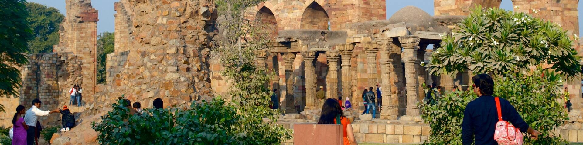 Qutub Minar featuring building ruins and heritage architecture