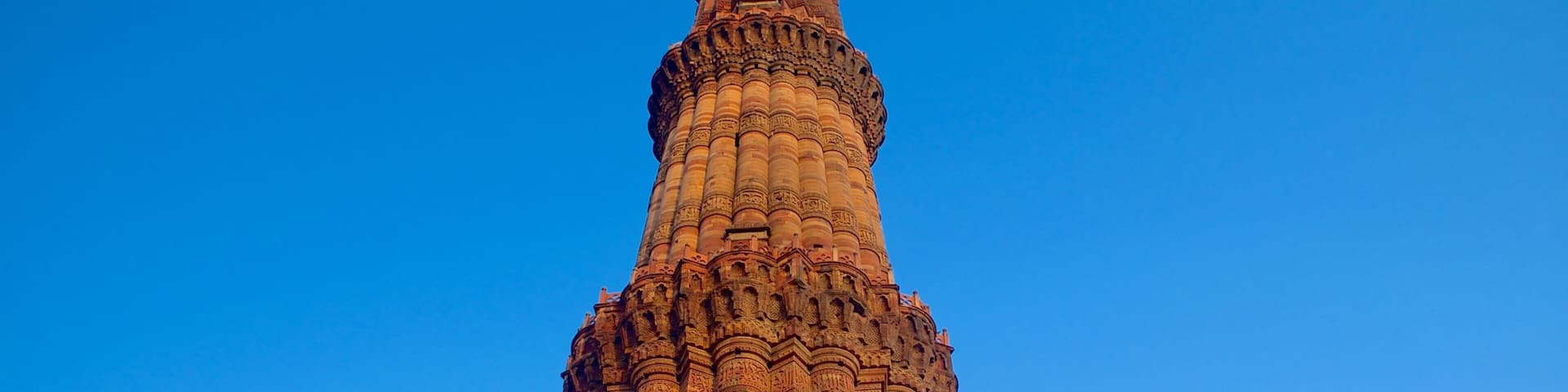 Qutub Minar featuring heritage architecture and religious aspects