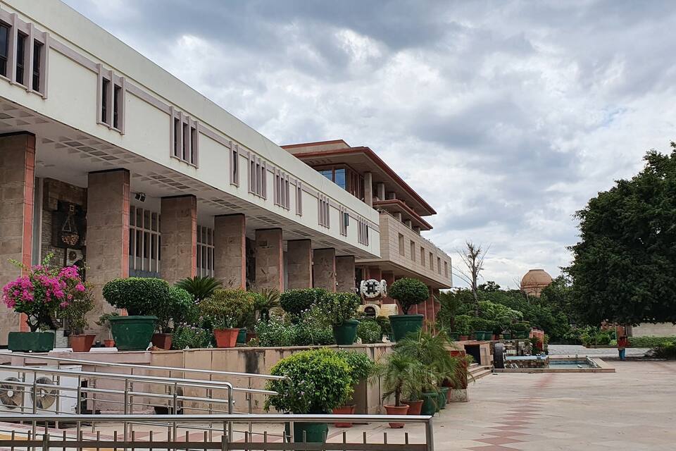 A building with columns and a flag.