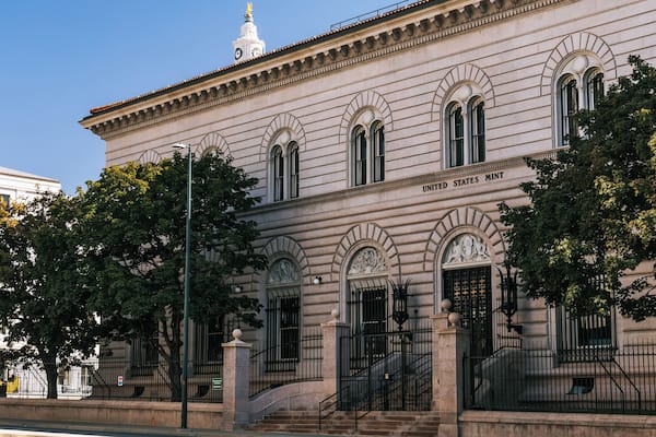 A historic building with ornate architecture, including arched windows and a prominent entrance.