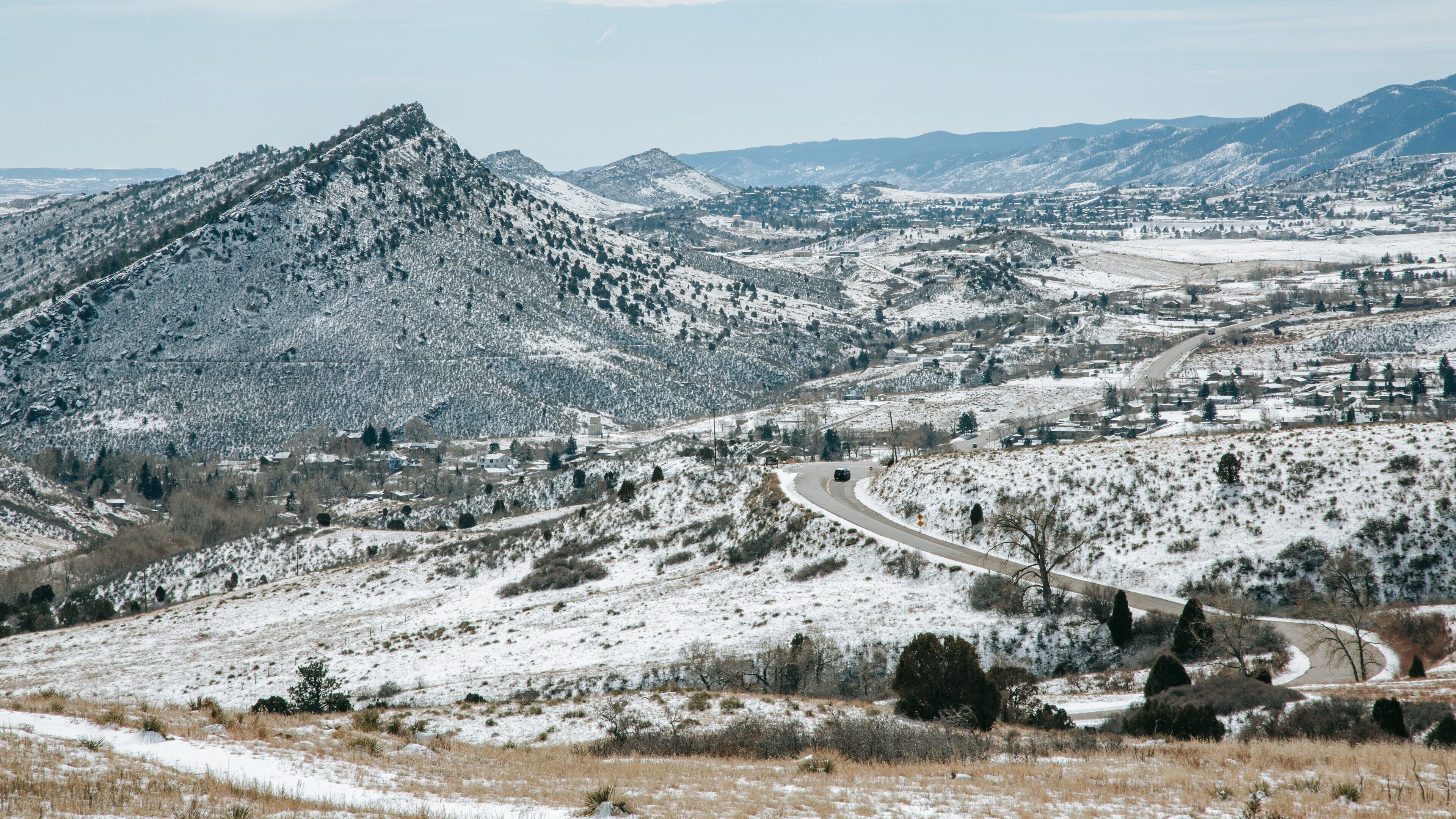 Red Rocks Amphitheater featuring mountains, landscape views and snow