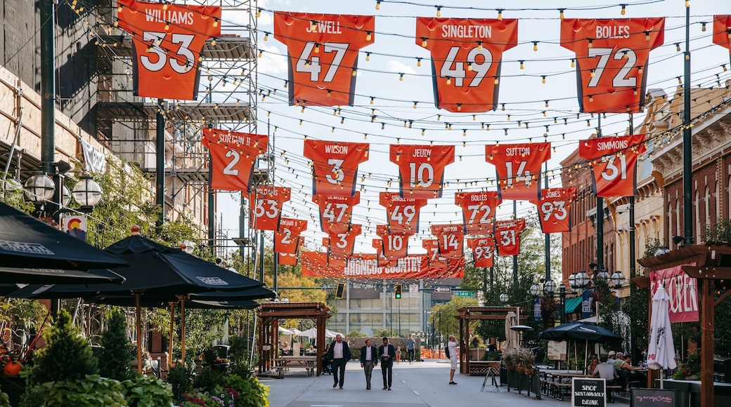 Larimer Square featuring street scenes and signage