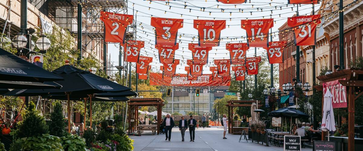 Larimer Square featuring street scenes and signage