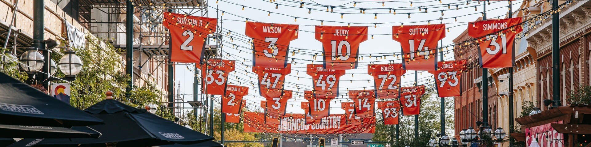 Larimer Square featuring street scenes and signage