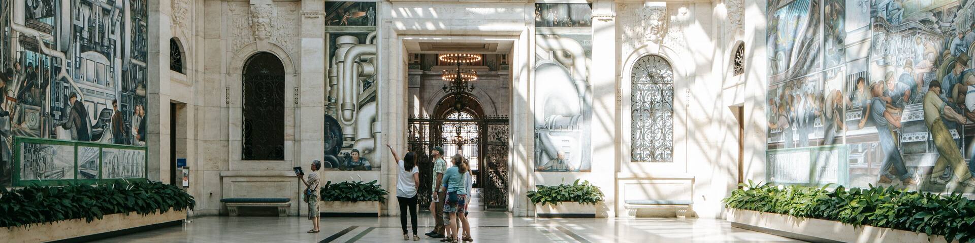 Detroit Institute of Arts showing interior views and heritage elements as well as a small group of people