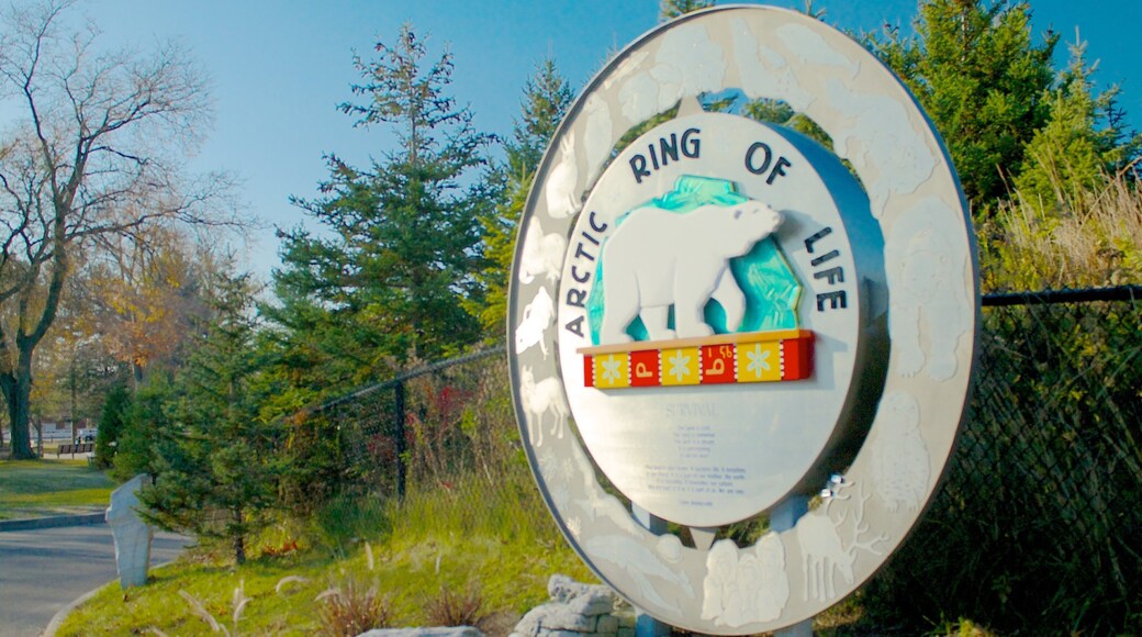 Detroit Zoo featuring landscape views, outdoor art and signage