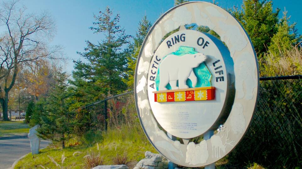 A sign with the Arctic Ring of Life emblem.