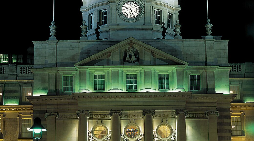 front view of an old fashioned building lit up at night