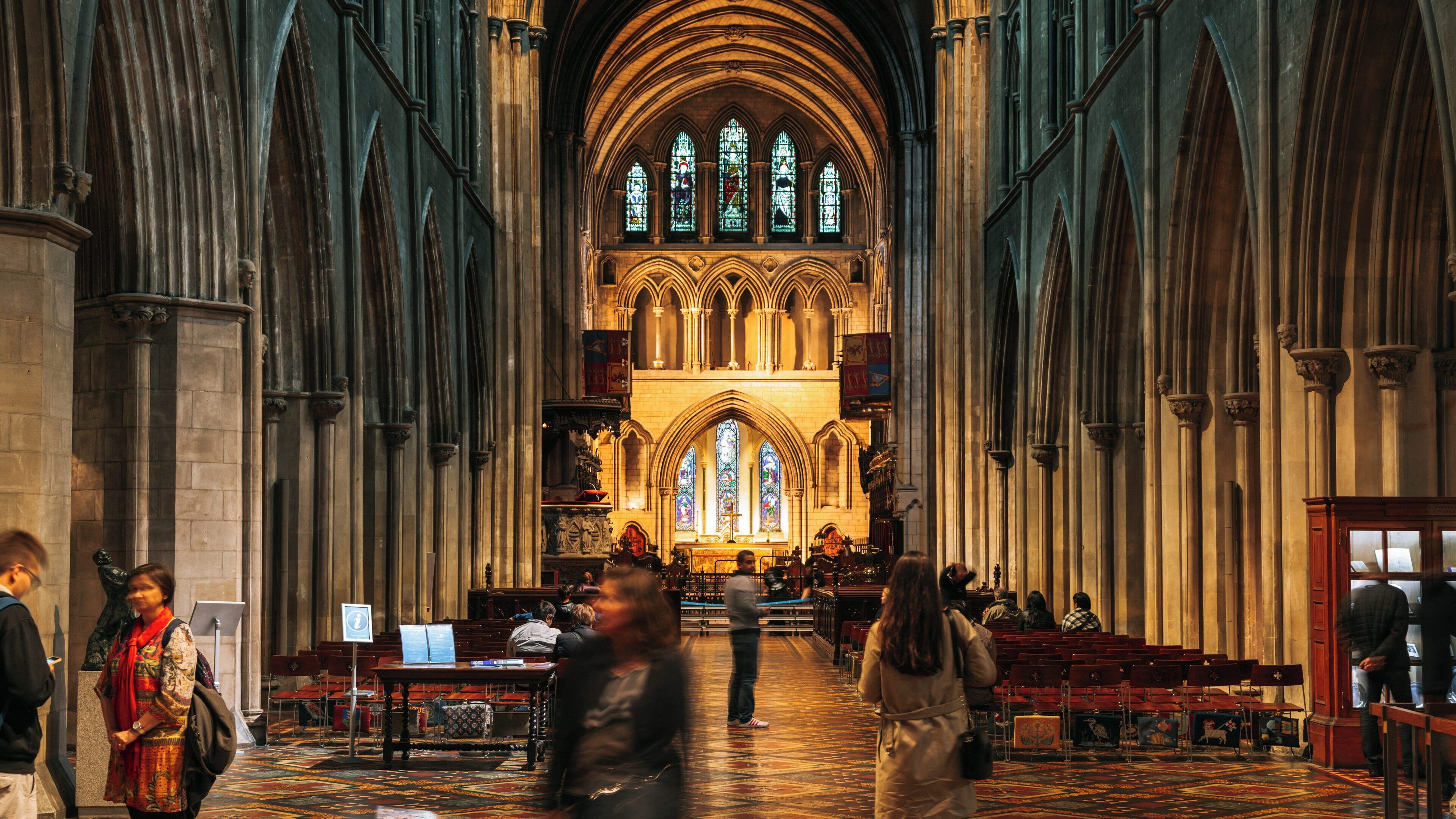 St. Patrick's Cathedral showcases stunning architecture and vibrant activity in Dublin city center, Ireland during a bustling day