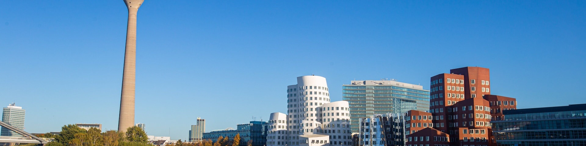 Rhine Tower showing a bay or harbor, a city and views