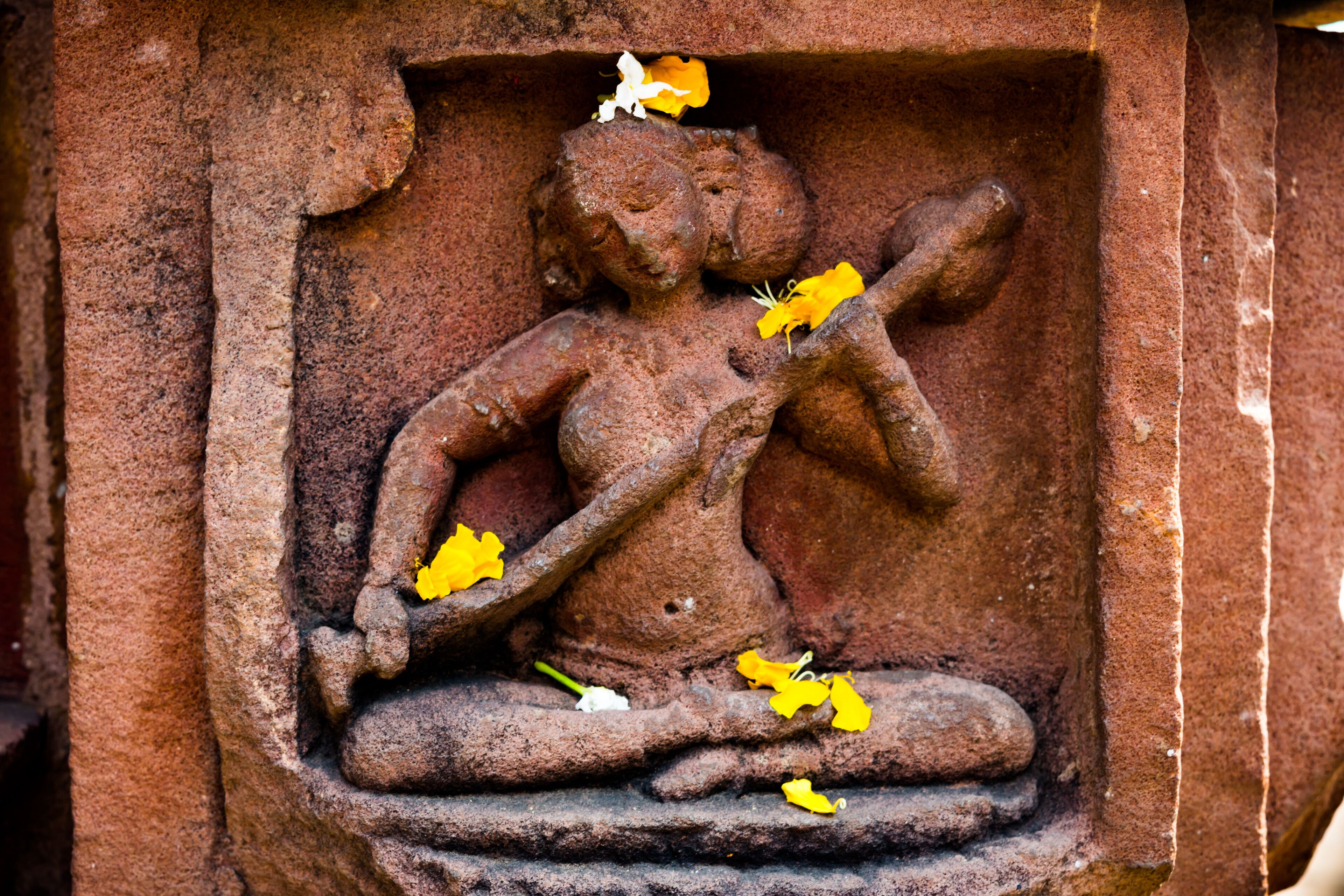 Sculpure of a goddess carved on the Mukteshwar Temple in Bhubaneshwar, 