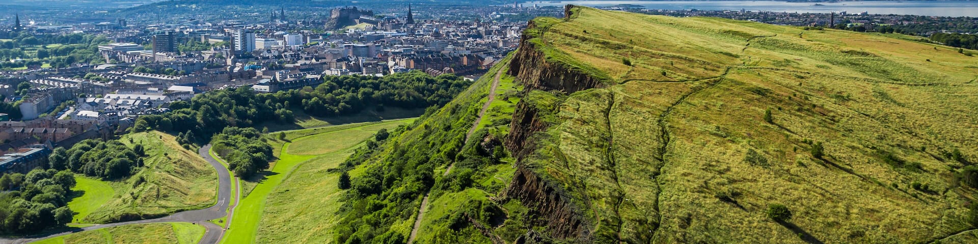 Edinburgh and green hills in summer